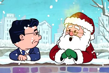 Santa chats it up with the Charlie Brown version of Stephen Colbert