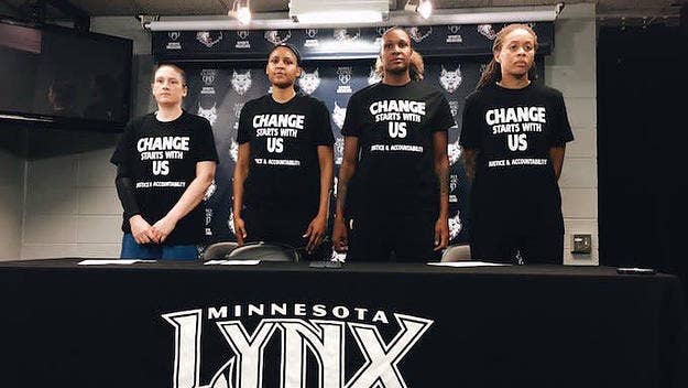 Minnesota Lynx players pay tribute to the lives of Philando Castile and Alton Sterling with their warm-up shirts.