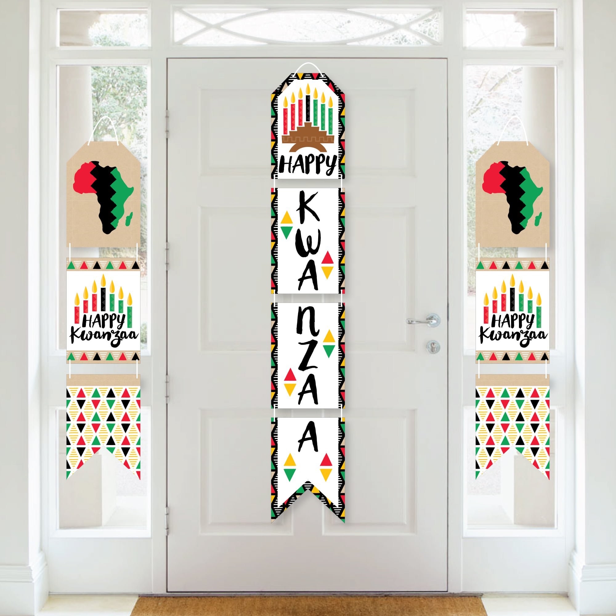 who smaller "happy kwanzaa" banners with candle and Africa illustrations and one larger one with bigger text