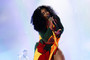 SZA is seen performing live