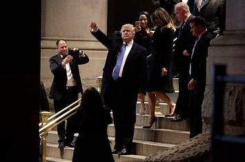 Donald Trump and Lady Melania Trump leave after dinner at Trump International Hotel o
