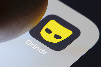Grindr is displayed on a smartphone.