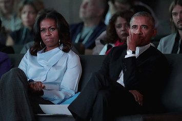 The Obamas Sitting During Conference
