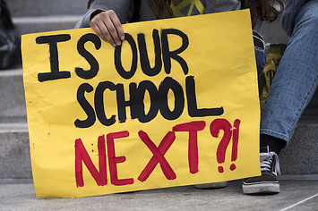 A teenager's sign during a protest for gun reform.