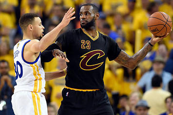 LeBron James holds the ball away from Stephen Curry during the 2016 NBA Finals.
