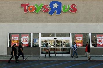 Customers shop at a Toys 'R' Us store.