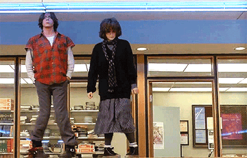 Characters dancing in the library in The Breakfast Club