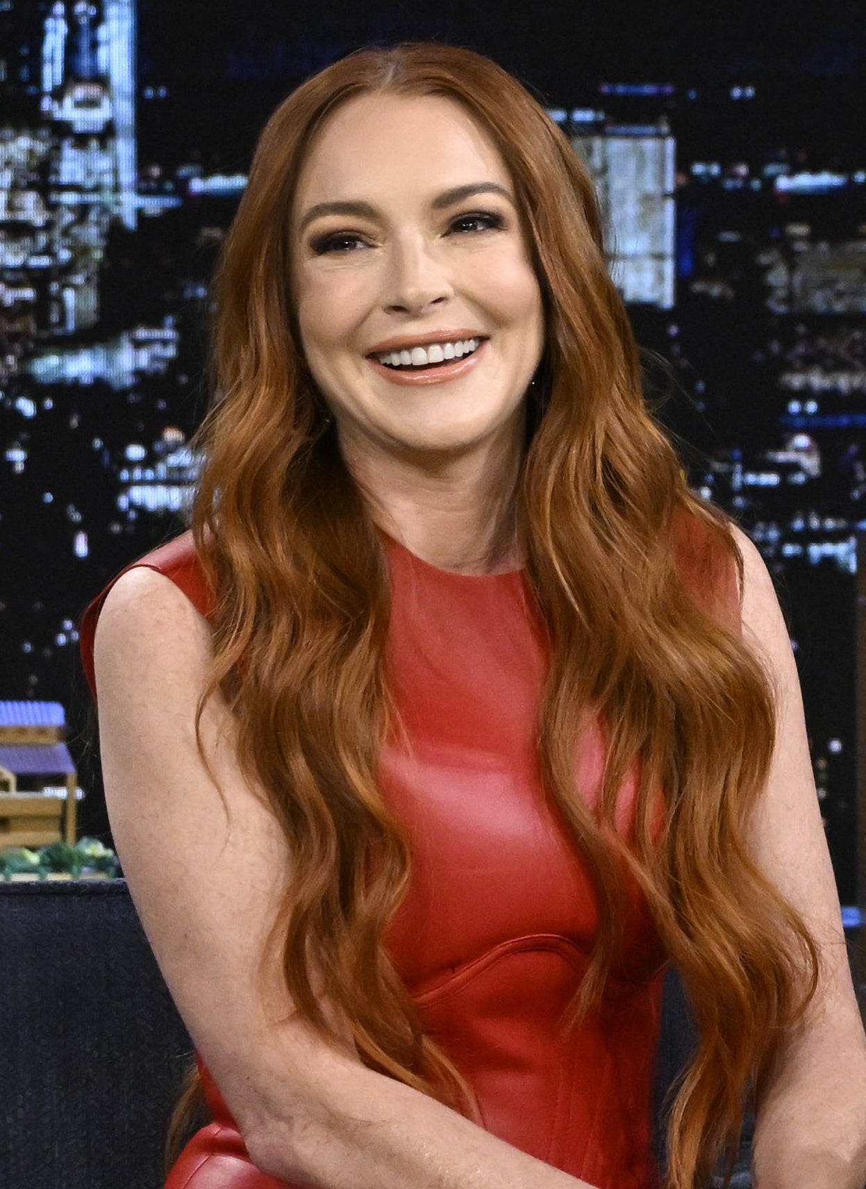 Lindsay Lohan laughing on a talk show