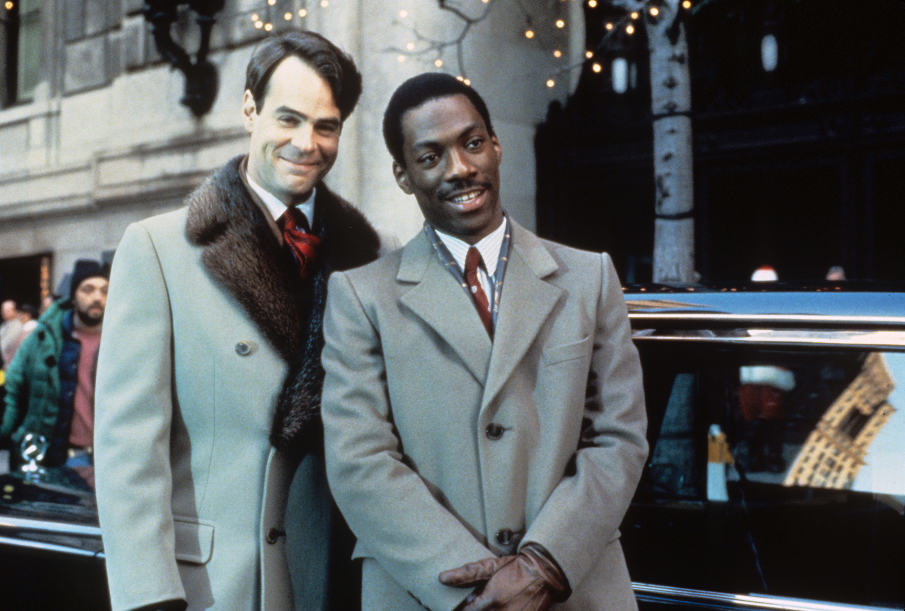 Dan Aykroyd and Eddie Murphy standing outside in NYC