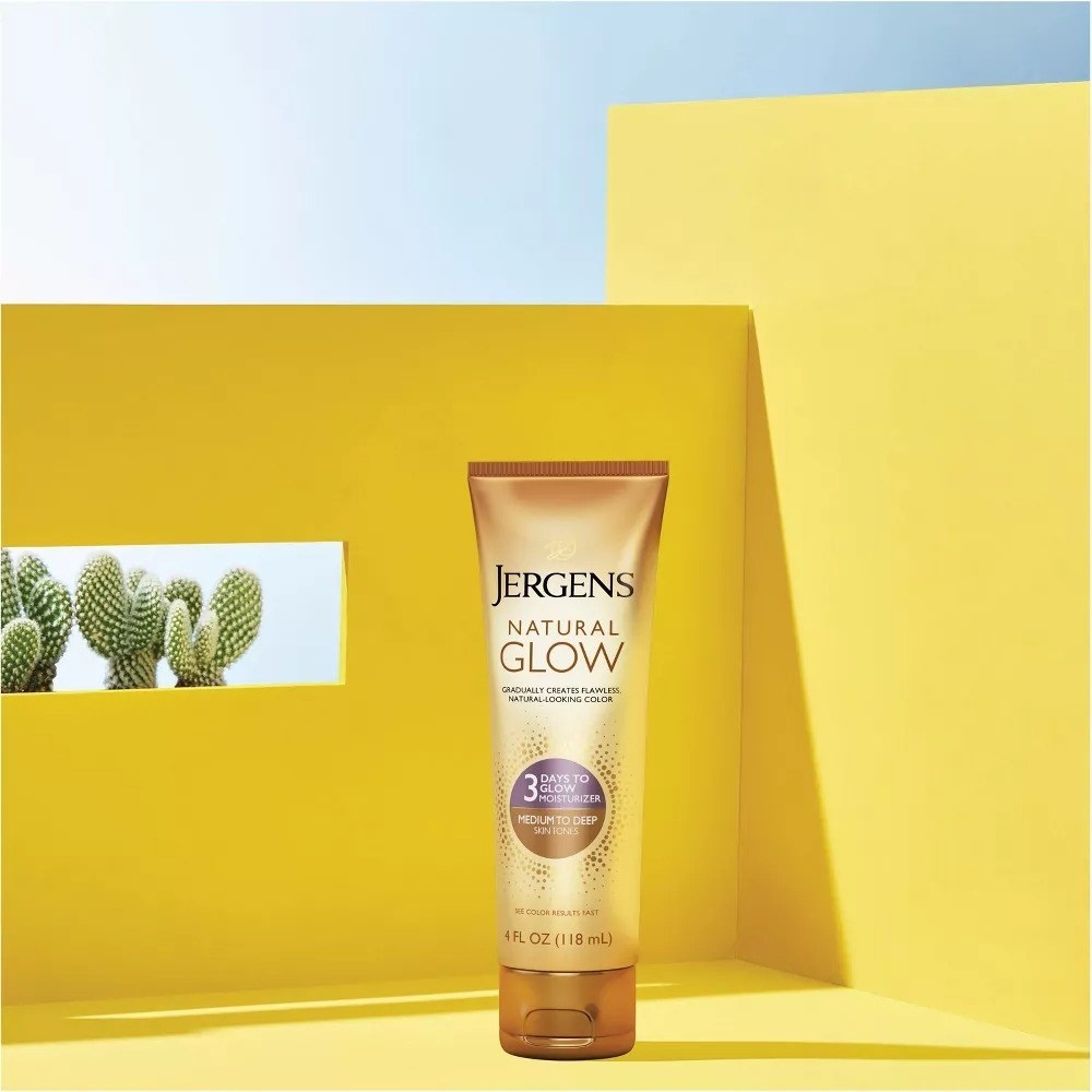 the bottle of jergens lotion on a yellow background