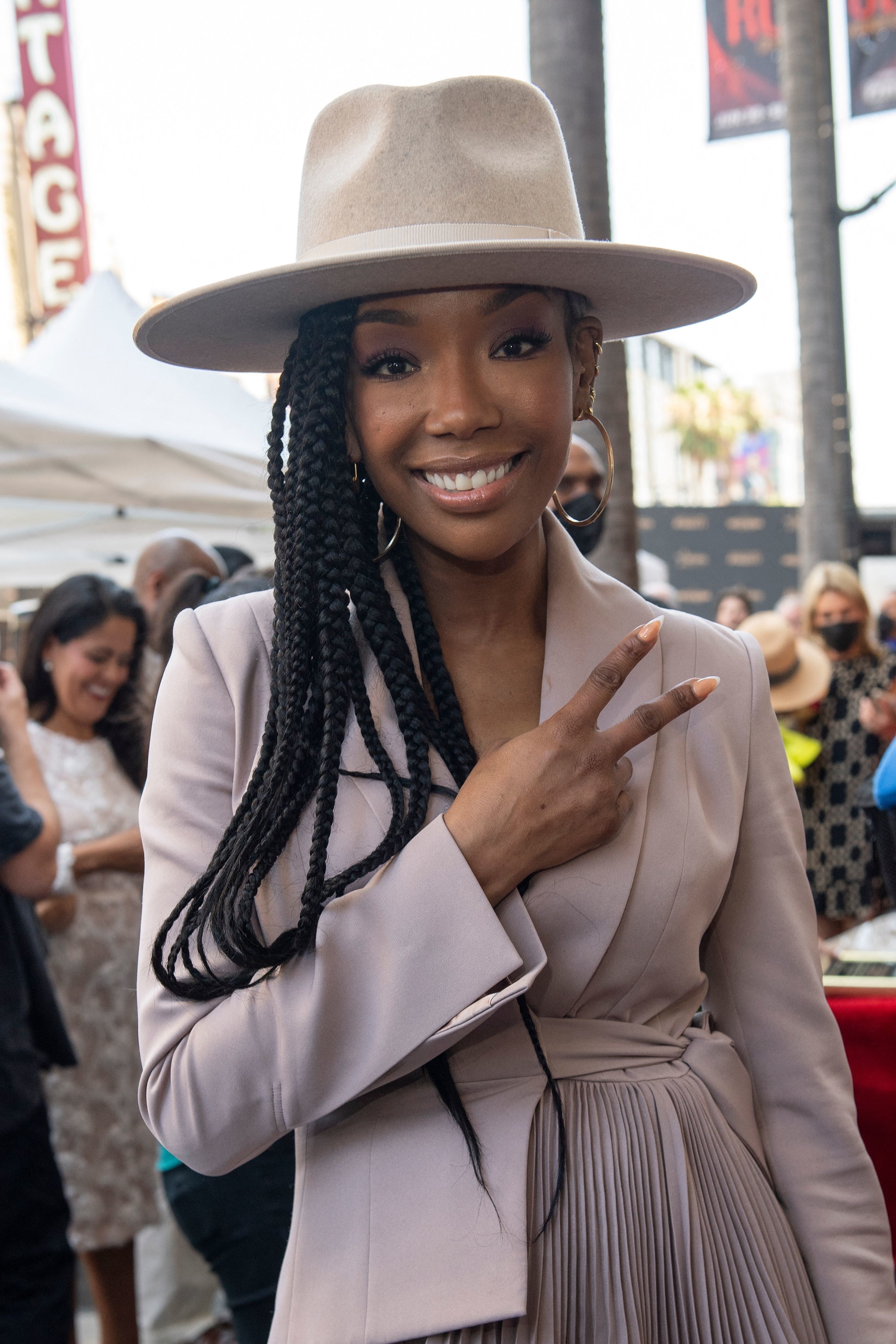 Brandy giving the peace sign