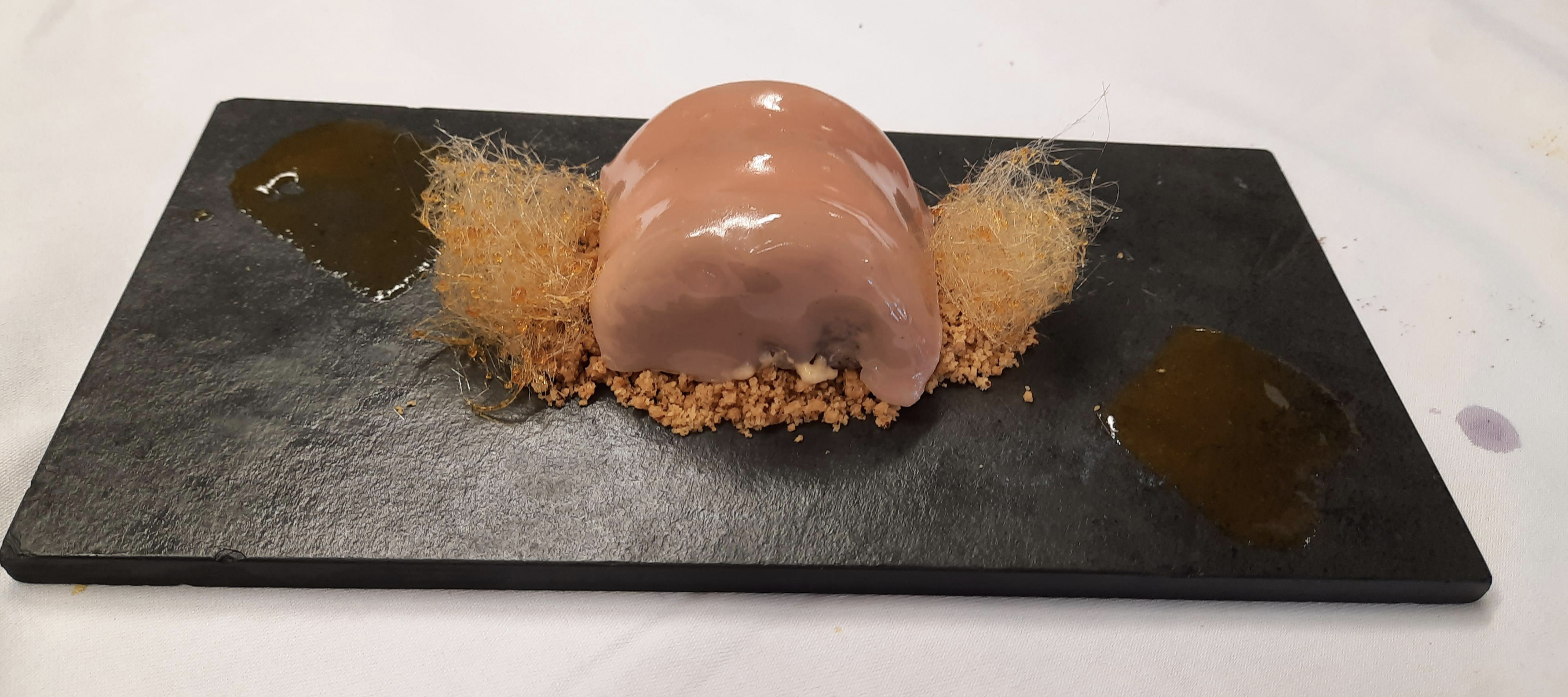 A dessert with a light brown glaze on it