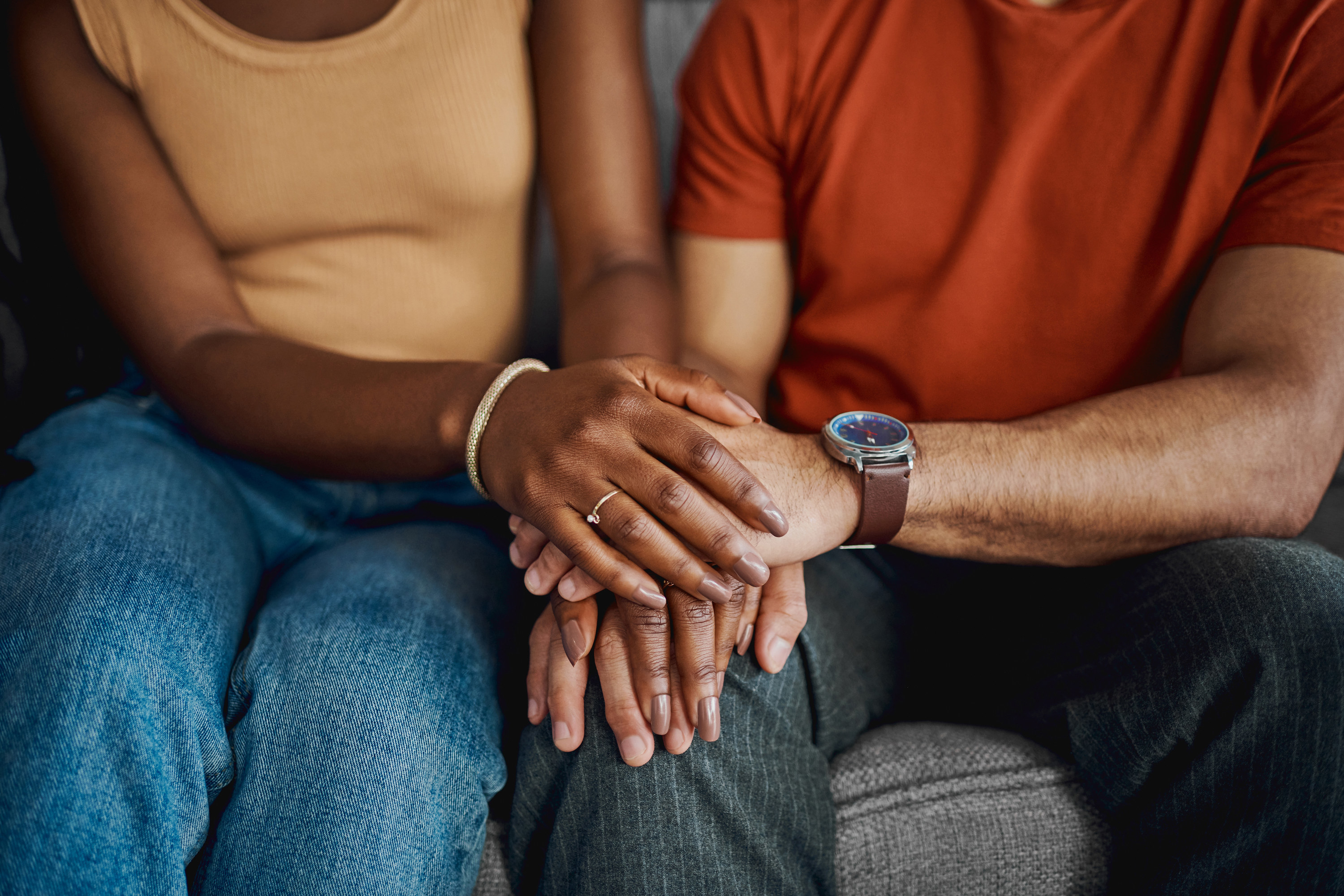 two people holding each other&#x27;s hands