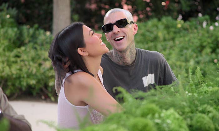 Travis Barker and Khloe Kardashian laughing