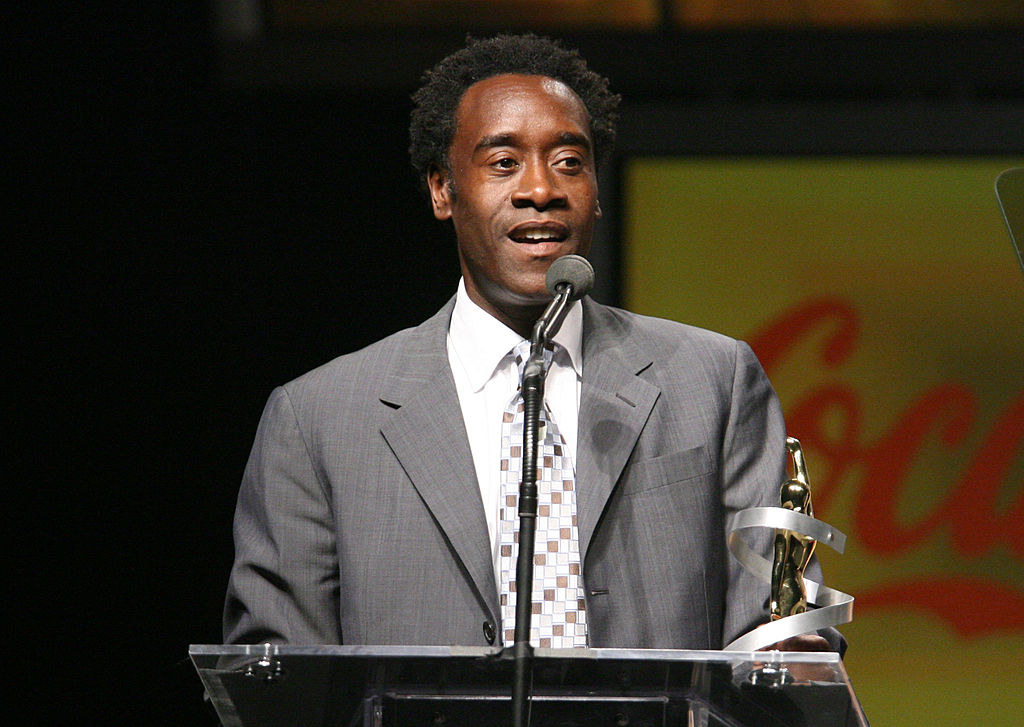 Don at a podium with an award