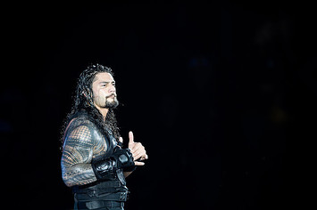Roman Reigns reacts during to the WWE Live Duesseldorf event.