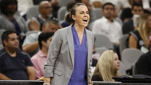 Spurs assistant Becky Hammon is sticking with San Antonio.
