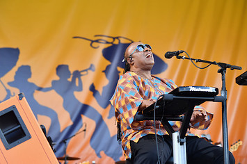 Stevie Wonder performs onstage during the 2017 New Orleans Jazz & Heritage Festival.