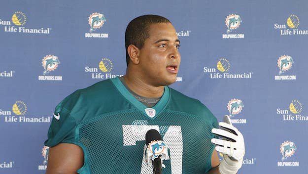 New details on Jonathan Martin's February arrest reveal he had an ax, knife and loaded shotgun in his car when he was taken into custody.