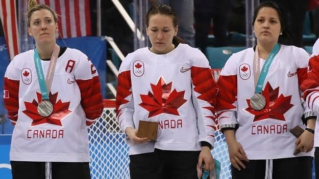 Canada's Jocelyne Larocque was spotted removing her silver medal after losing to the U.S. in the Olympic final on Thursday.