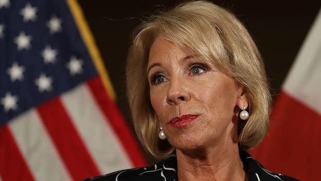 The Secretary of Education stopped by the high school for a short press conference filled with vague answers. 