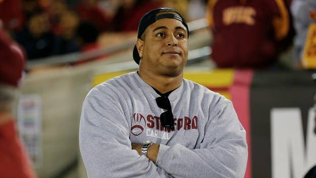 Ex-NFL lineman Jonathan Martin was taken into custody after he posted a picture suggesting he was going to shoot up his former high school.