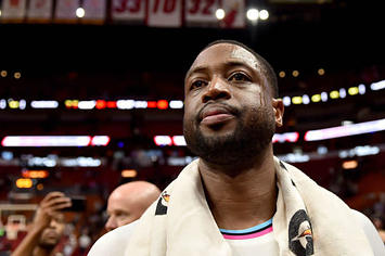 Dwyane Wade looks for family after a game against the Bucks.