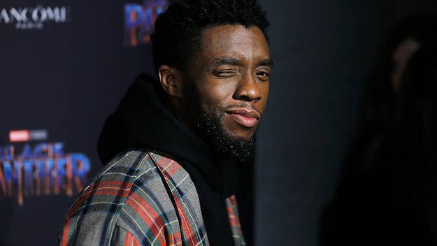 A man proposed to his girlfriend on opening night dressed as King T'Challa.