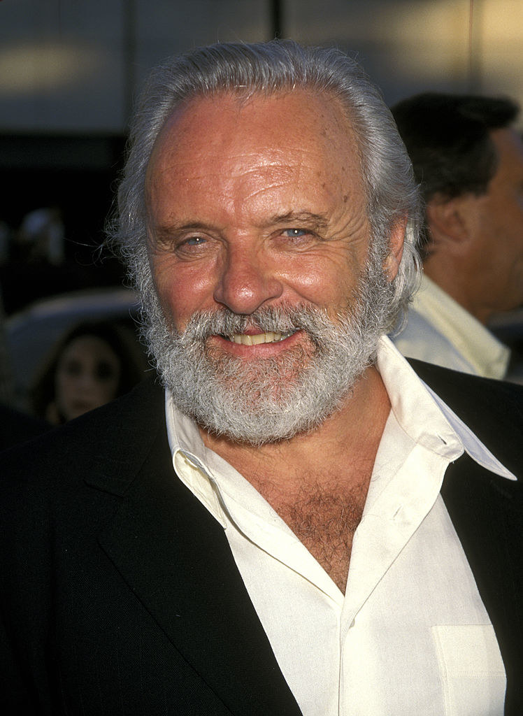 Close-up of a bearded Anthony smiling