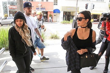 Blac Chyna with Rob and Kim Kardashian