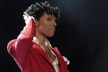 Prince performs at the 10th Anniversary Essence Music Festival