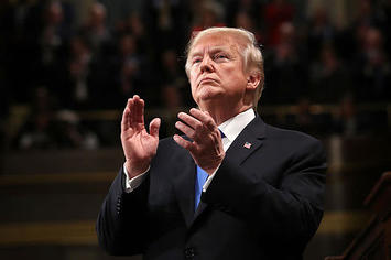 Donald Trump clapping at the 2018 State of the Union address.