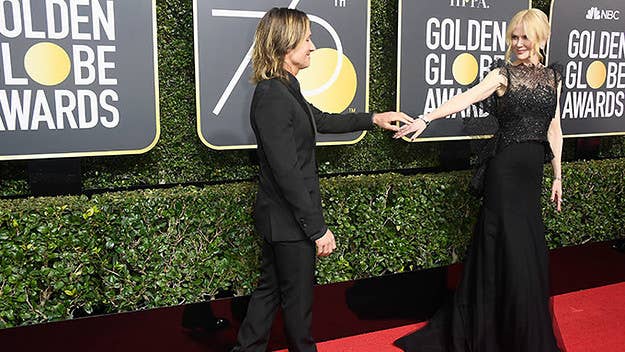 The red carpet at the Golden Globes was a "sea of black" this year. Find out who went monochromatic.