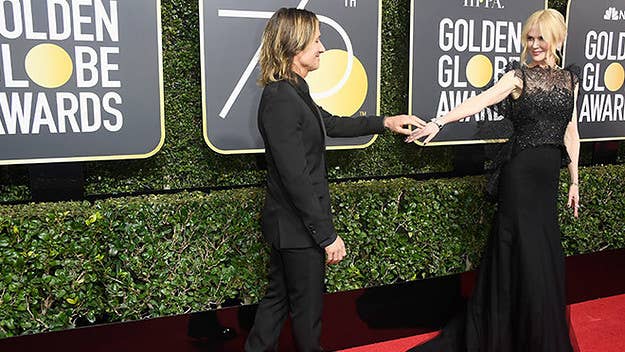 The red carpet at the Golden Globes was a "sea of black" this year. Find out who went monochromatic.