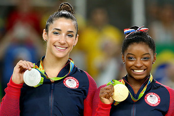 Ali Raisman and Simone Biles at the Rio Olympics.