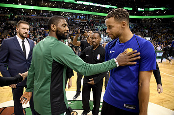 Kyrie Irving and Stephen Curry shake hands before matching up in Boston.