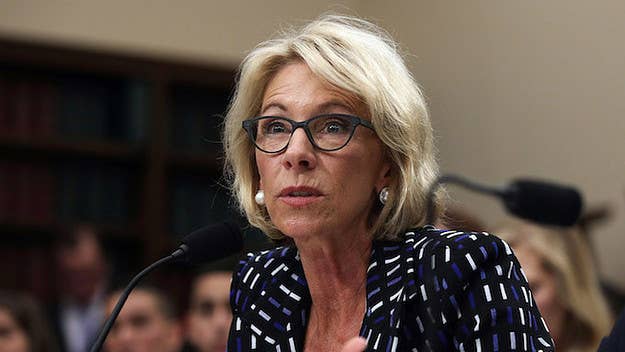 Three civil rights groups are seeking to reverse Betsy DeVos' rules for sexual assault on college campuses.