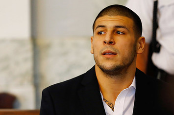 Aaron Hernandez sits in the courtroom of the Attleboro District Court.