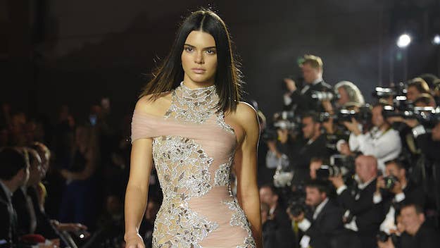 Neither Kendall Jenner or Bella Hadid took that cute photo of a deer in a bed of flowers.
