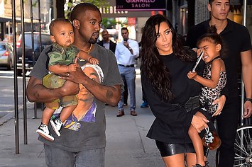 Kanye West and Kim Kardashian with son Saint and daughter North.