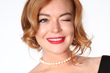 Lindsay Lohan arrives at the amfAR Gala Cannes 2017