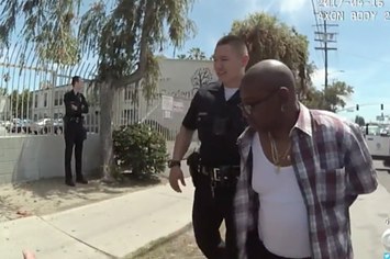 Body cam appears to show LAPD planting drugs on black suspect.