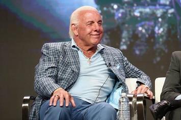 Ric Flair speaks on a panel.