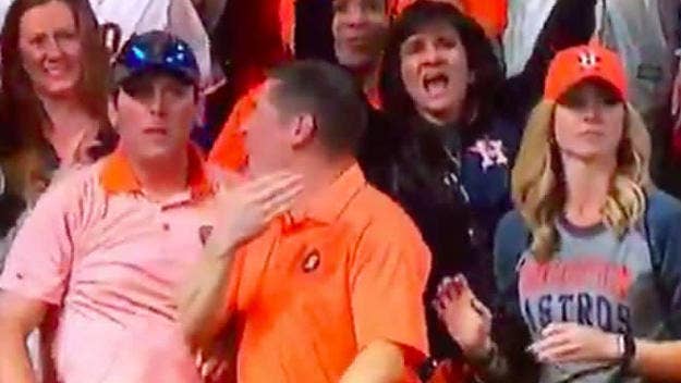The Astros fan who stole Yasiel Puig's World Series home run ball from a woman and threw it back on the field explains why he did it.