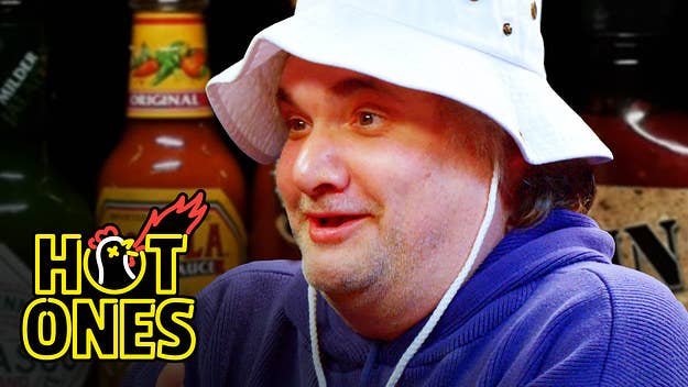 Comedian Artie Lange takes on the Hot Ones challenge with host Sean Evans.