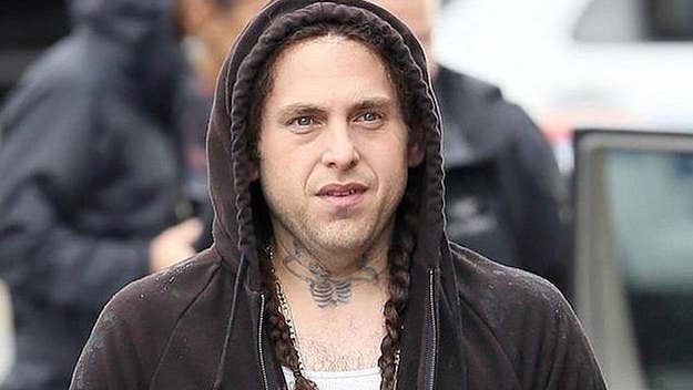 Jonah Hill was pictured in long braids and with several finger and neck tattoos on the set of his new Netflix show 'Maniac.'