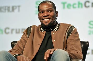 Kevin Durant smiles at Tech Crunch.