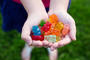 Child holding gummy bears