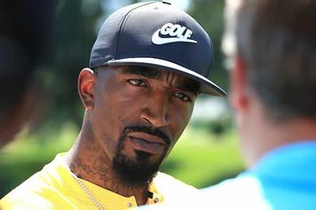 J.R. Smith speaks with a reporter.