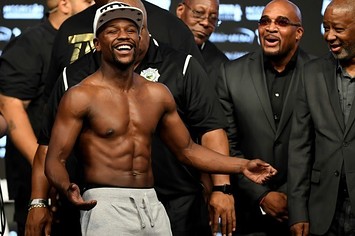 Floyd Mayweather laughs at his weigh in.